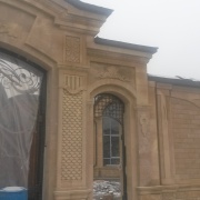 Фасад облицованный натуральным камнем472